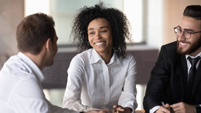 Professionals meeting to discuss legal documents